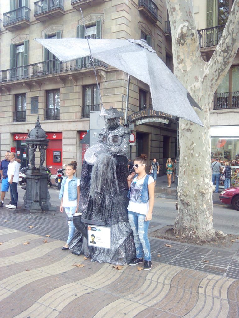 Human Statues or street beggars in Barcelona dressed up as yoshimitsu